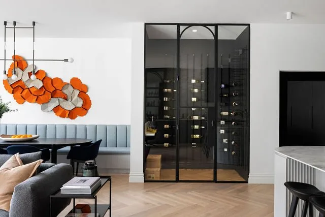 Balmerino, Mount Eliza. Glazed wine cellar off the living room.