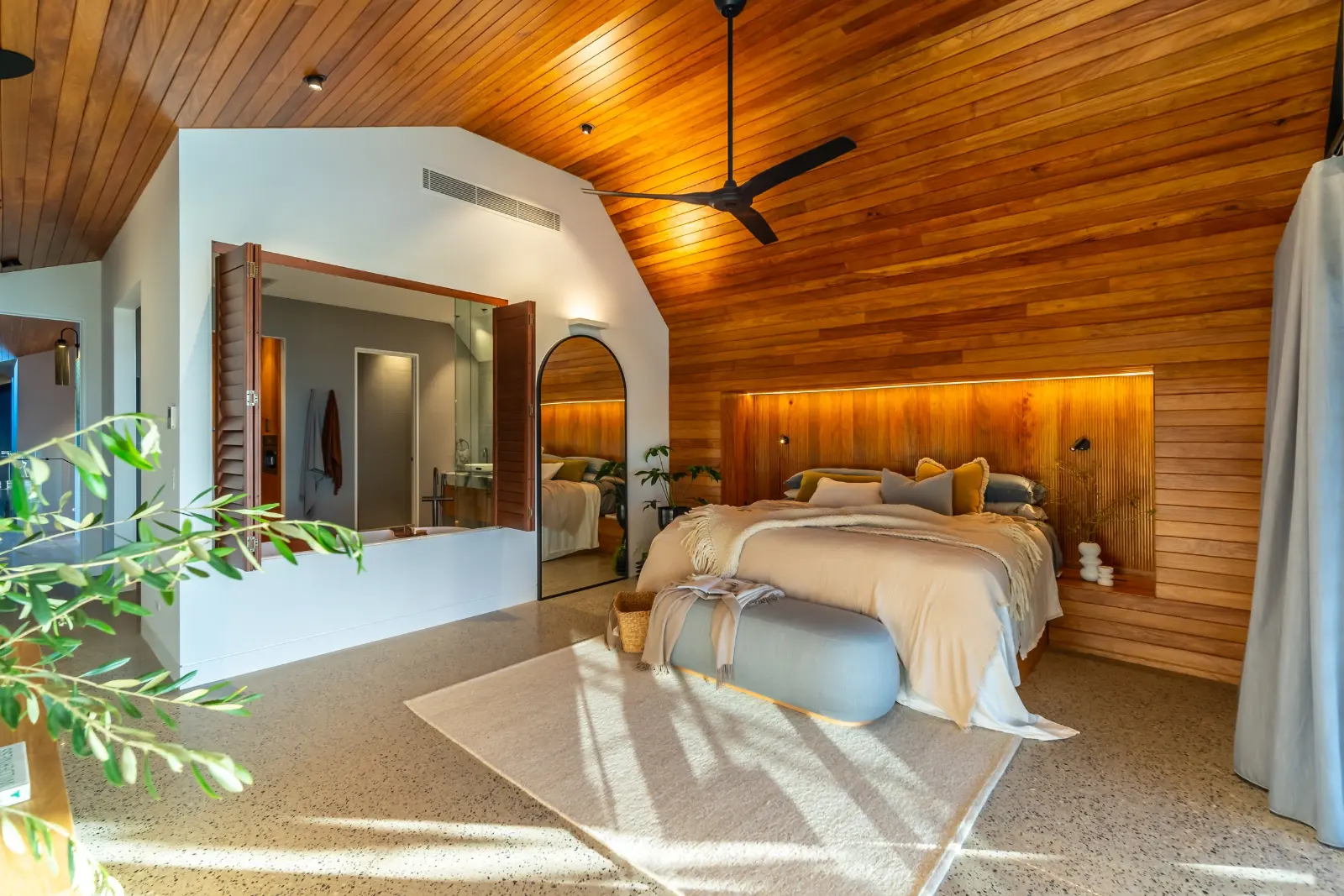 Larimar, Whitsundays. Main bedroom with the timber wall.
