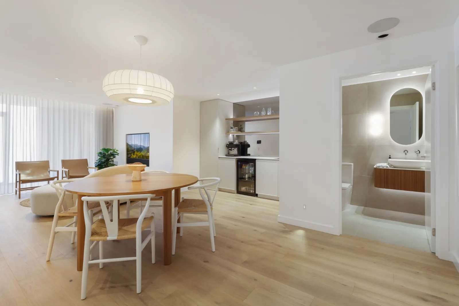 The Dromana studio showroom. Dining, kitchenette and powder room, lighting on one scene.